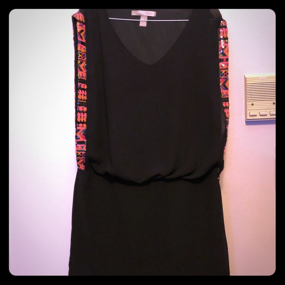 Black dress with sequin trim sleeves